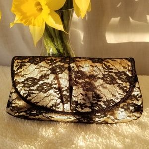 NWOT Gold and black lace clutch